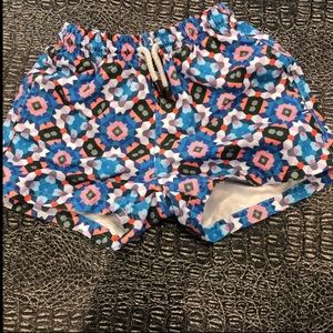 98 coast geometric pattern swim trunks